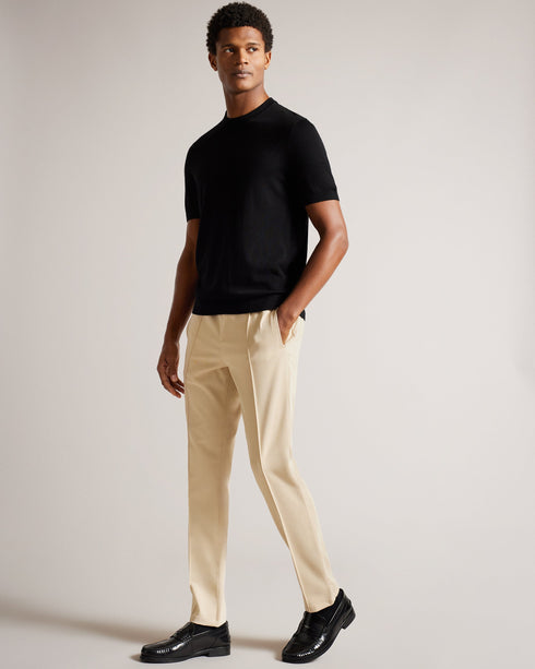 RODNY-Trousers-Make an entrance in the RODNY trousers. Exquisitely tailored and an excellent addition to any man's wardrobe, this pair of trousers will make your mark on the boardroom. Trousers Slim fit Zip and button fastening Elasticated waist Pockets Braided piping Joseph is 6'1" / 1.85m and wears Navy in 32 R- Ted Baker Romania
